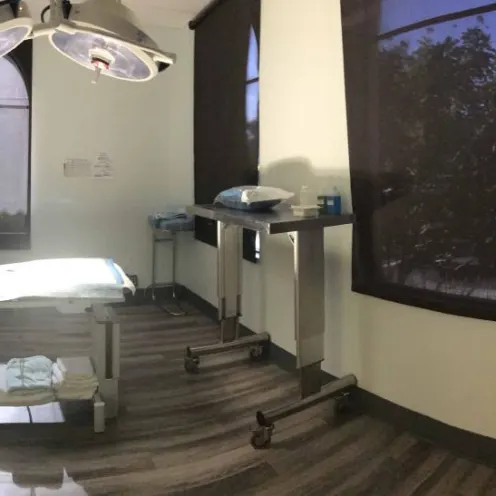 A SCAN Naples' exam room with a large amount of veterinary medical equipment